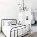Iron bed in bedroom