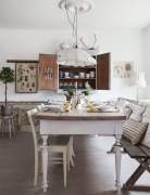 Chairs and bench next to a table