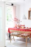 Chairs and bench next to a table