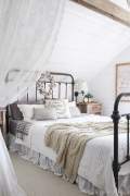 Iron bed in bedroom