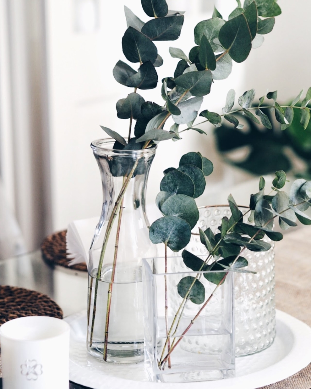 glass vases with eucalyptus