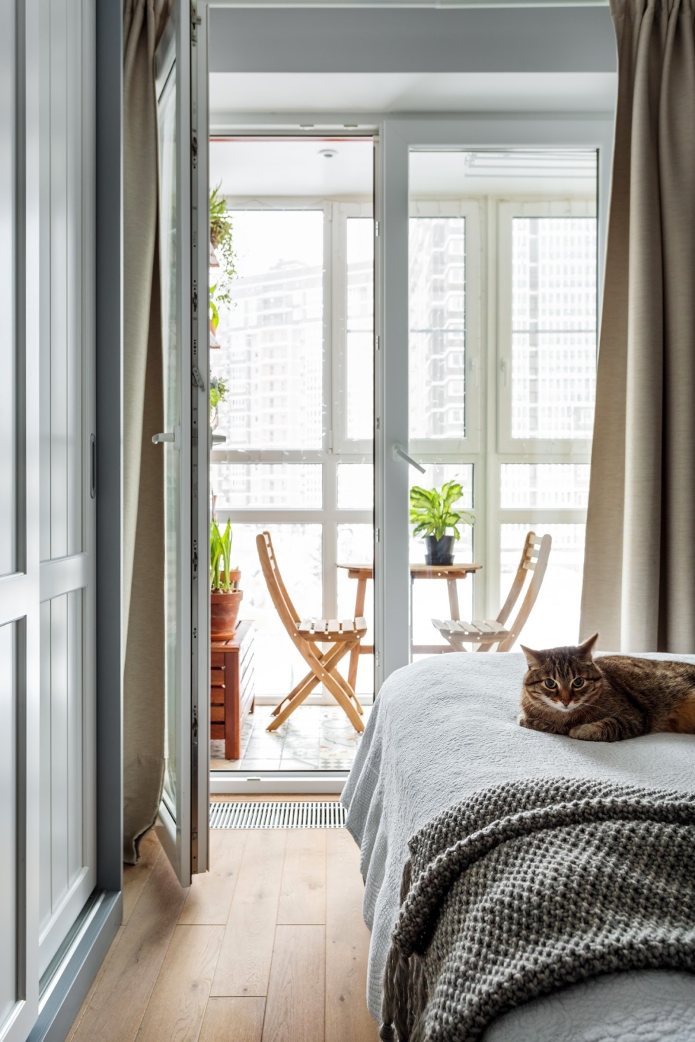 bedroom with a balcony