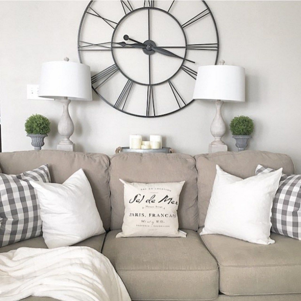 clock above sofa